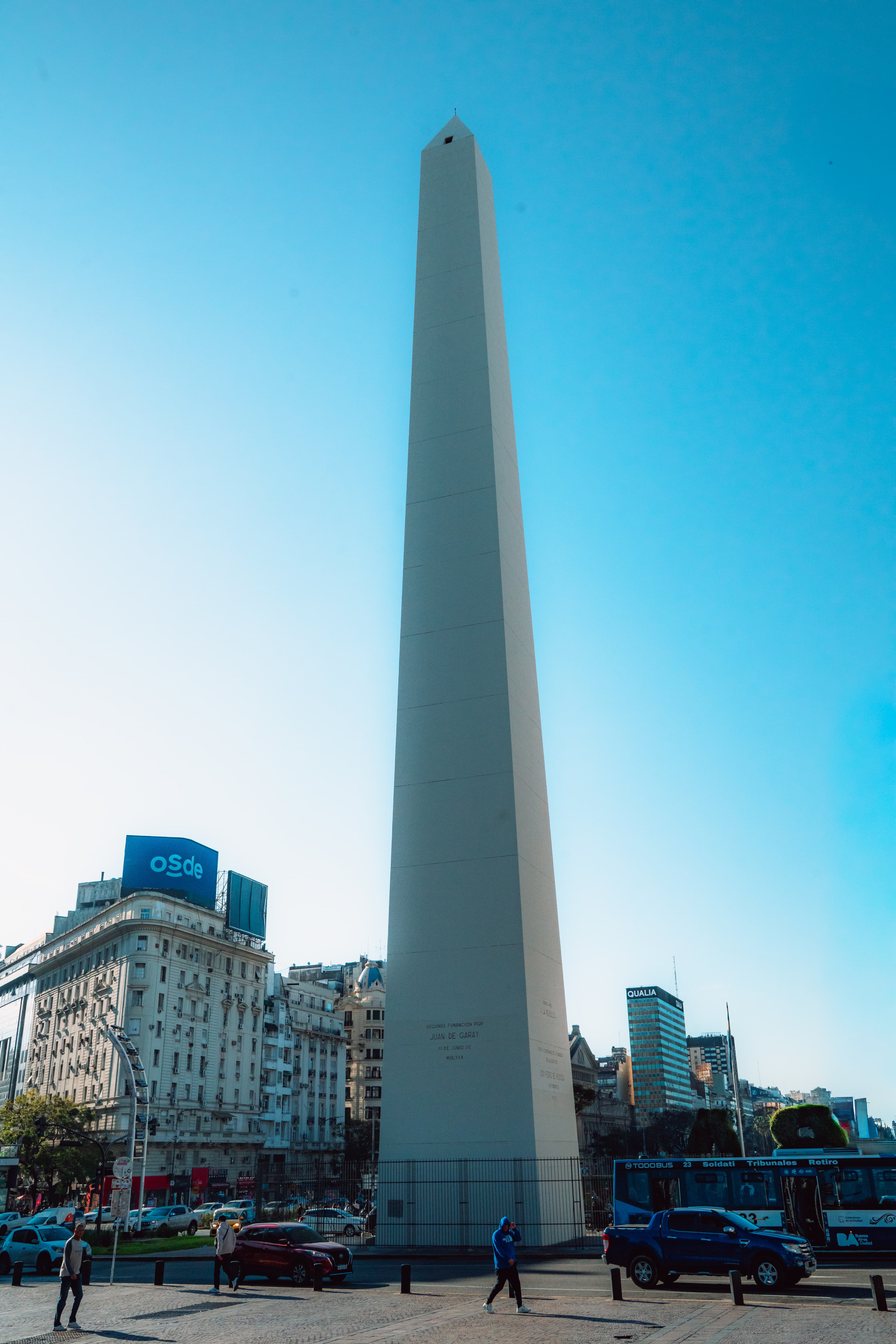 The Obelisk monument in Buenos Aires reaching into a bright blue sky.